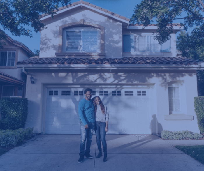 Nevada Homeowners in front of home